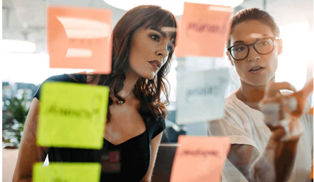 Image of two people in an ideation session.